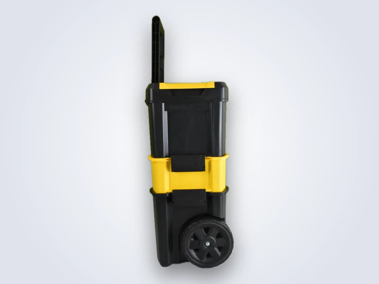 The Max S 500 rolling case from the side with the pull handle raised, showing the wheels